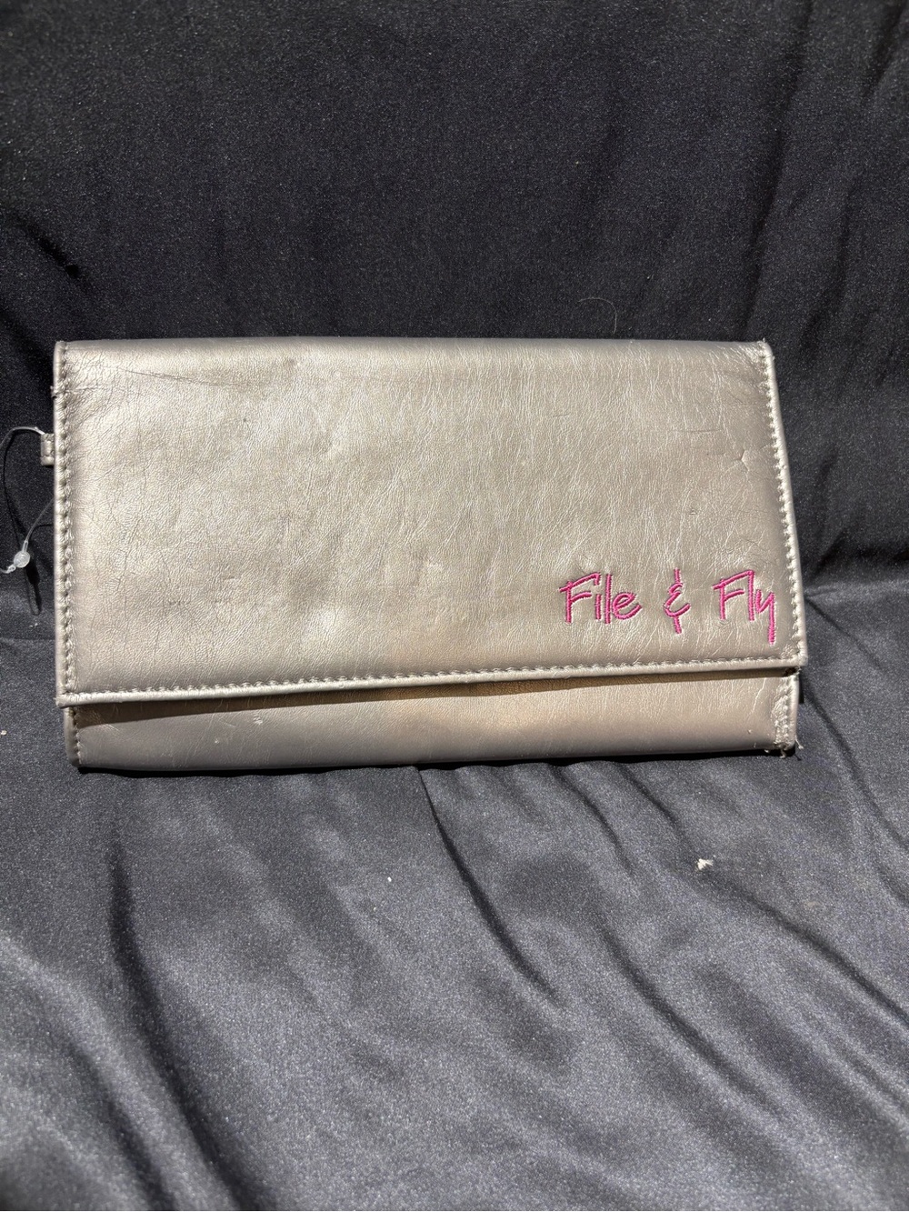 Metallic Silver Foldover Clutch with Pink Script Logo